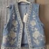 Geborduurde denim gilet