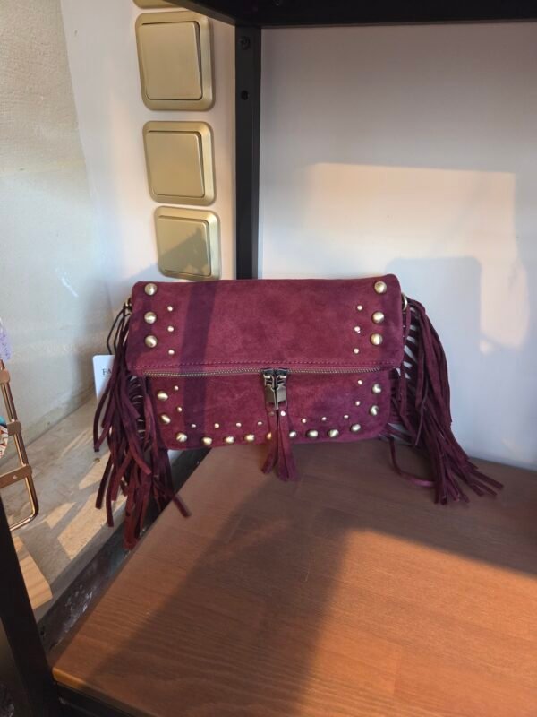 suède tas met franjes