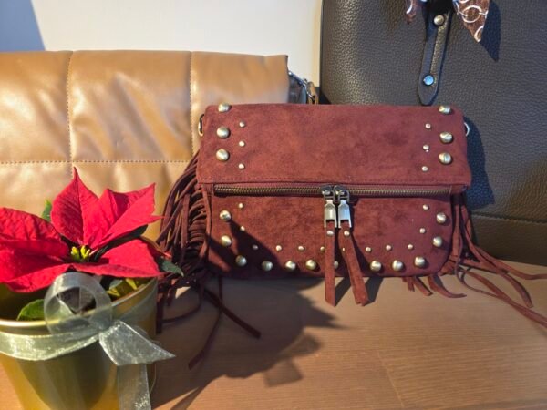 suède tas met franjes